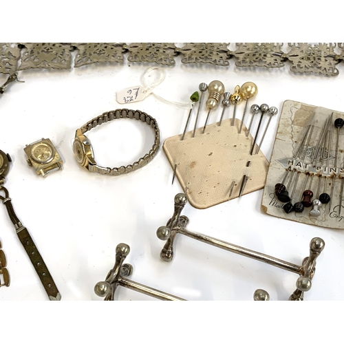 413 - A mixed lot to include silver plated belt; a collection of metal and ceramic thimbles to include Dor... 