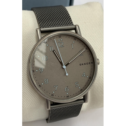 174 - A gents boxed Skagen watch; together with a pair of boxed Skagen cufflinks