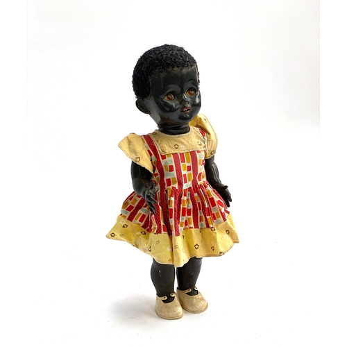 431 - A vintage 1950s Pedigree walking black doll