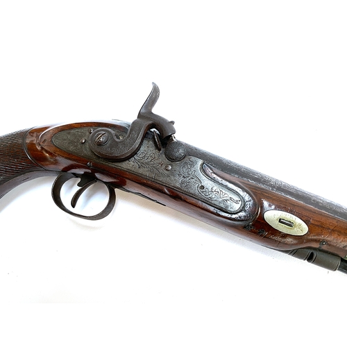 438 - A 19th century flintlock converted to percussion cap target pistol, the 20.5cm barrel engraved with ... 