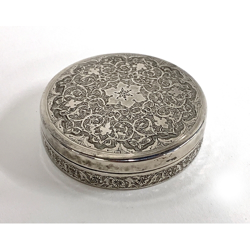 130 - Small Persian 40 grade silver circular lidded box chased with profuse floral decoration hallmarked t... 