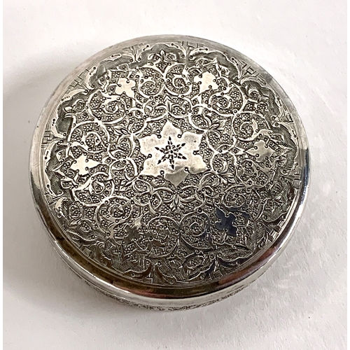 130 - Small Persian 40 grade silver circular lidded box chased with profuse floral decoration hallmarked t... 