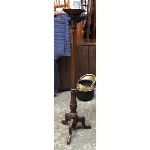 1194 - A 19th century mahogany torchere/pot stand on carved tripod base, 145cmH