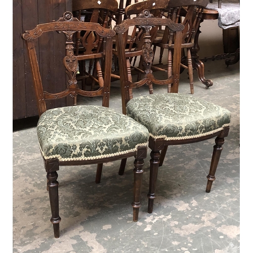 1245 - A pair of 19th century carved side chairs with stuff over upholstered seats