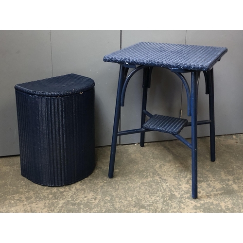 1236 - A dark blue Lloyd Loom laundry basket and Lloyd Loom occasional table, 54x53x71cmH