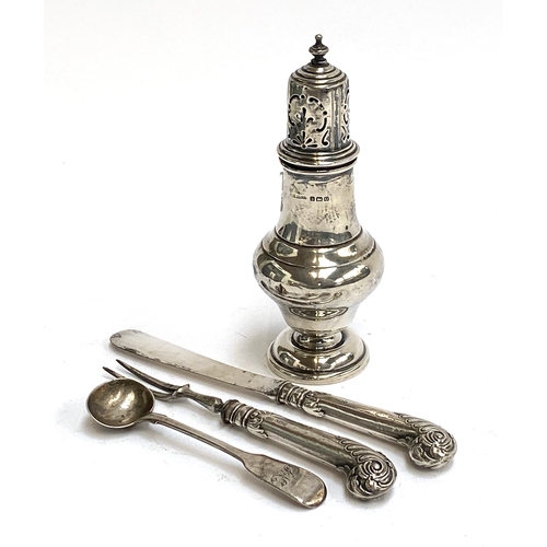 136 - A silver sugar caster, Birmingham 1913, and a silver handled butter knife and fork, weighable silver... 