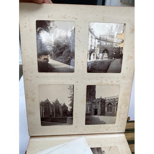 549 - A collection of 12 early 20th century quarter leatherbound photo albums, presumably privately bound ... 