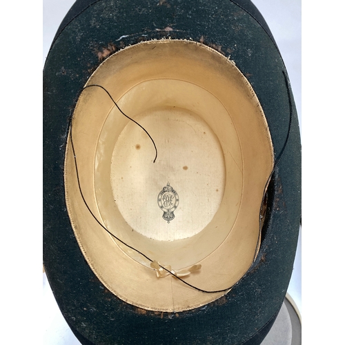 550 - A silk top hat by Henry Heath (af); a further silk top hat in Lincoln Bennett box; and a Lock & Co h... 