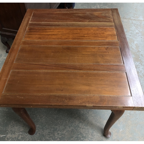 1217 - A 20th century drawer leaf extending table, on cabriole legs, 122x100x76cmH