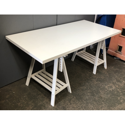 1268 - Two Ikea white trestle desks, each top 76x150cm