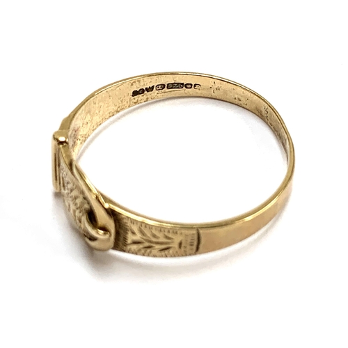 12 - A 9ct gold buckle ring, size U 1/2, 2.3g