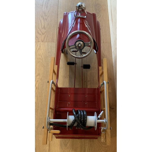 1275 - A Burns Novelty Co pressed steel pedal fire engine