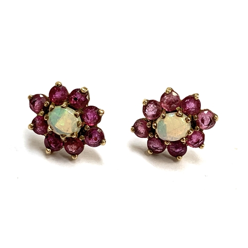 17 - A pair of 9ct gold, ruby and opal stud earrings, 1.3cmL, 2g