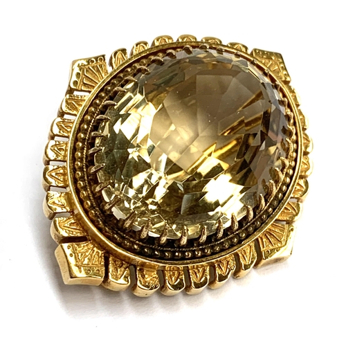 47 - An impressive 9ct gold mounted citrine brooch, the large citrine 2.8x2cm, hallmarked for H&SL,  Lond... 