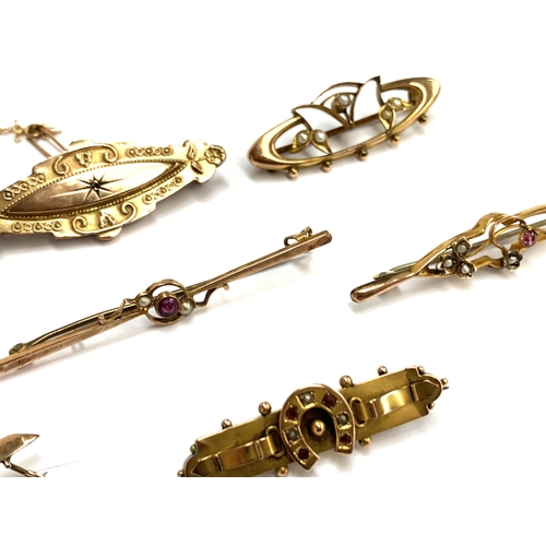 48 - A collection of eight late Victorian and Edwardian 9ct gold bar brooches: comprising two Victorian b... 