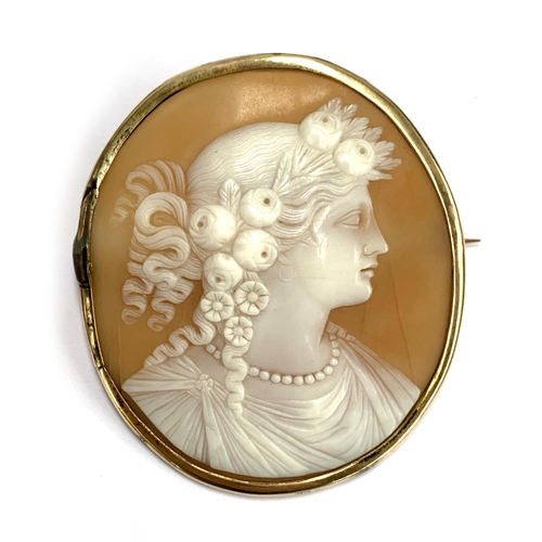 49 - A late Victorian 9ct gold mounted carved shell cameo brooch, 5.5cmL, 13.5g gross weight; together wi... 