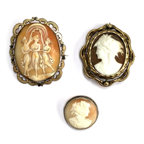 52 - Two carved shell cameo brooches, one gilt metal depicting the three graces; together with one moulde... 