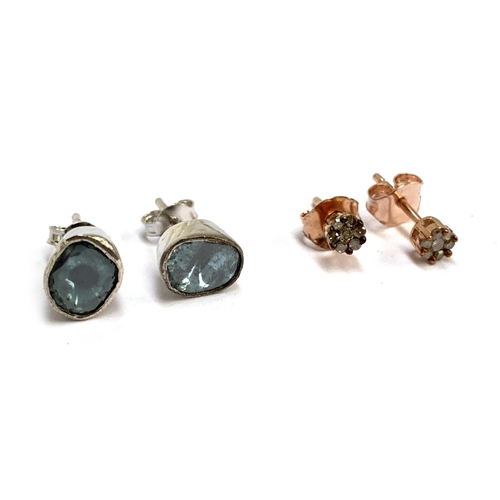 81 - A pair of silver and blue polki diamond stud earrings; together with a pair of rose vermeil silver s... 