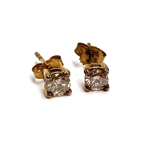 82 - A pair of 9ct gold champagne diamond stud earrings, the diamonds approx. 4.5mmD, 0.9g gross weight