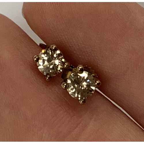 82 - A pair of 9ct gold champagne diamond stud earrings, the diamonds approx. 4.5mmD, 0.9g gross weight