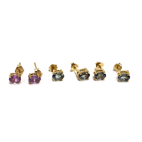 83 - A pair of 9ct gold purple sapphire stud earrings, the sapphires totalling 1.1ct; together with two p... 