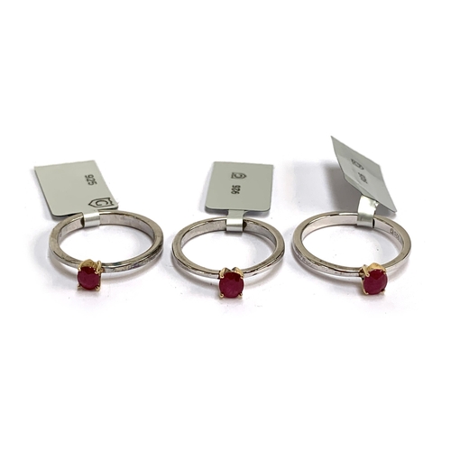 90 - Three sterling silver ruby solitaire rings with 14ct gold prongs, the Burmese rubies 0.4cts, size P,... 