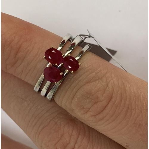 90 - Three sterling silver ruby solitaire rings with 14ct gold prongs, the Burmese rubies 0.4cts, size P,... 