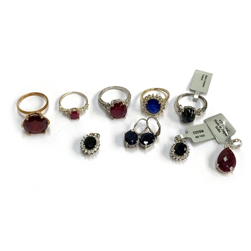 116 - A 9ct gold ring set with a large ruby, 8.3g gross; together with quantity of silver jewellery set wi... 