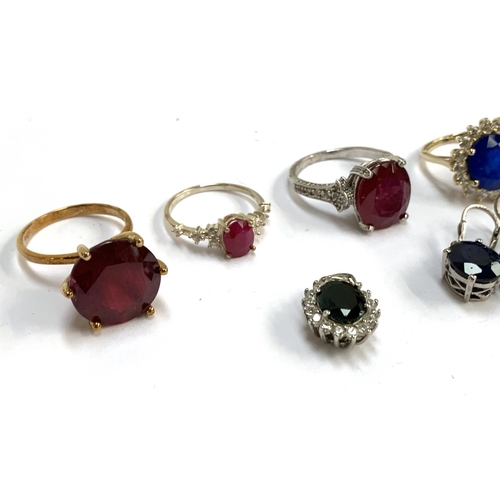 116 - A 9ct gold ring set with a large ruby, 8.3g gross; together with quantity of silver jewellery set wi... 