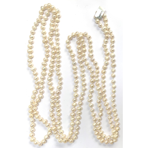 58 - An extremely long cultured freshwater pearl necklace, total length 126cm