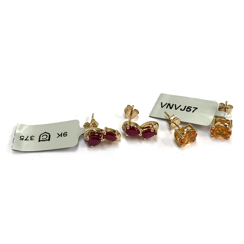 62 - A pair of 9ct gold stud earrings set with mandarin garnets, totalling 2.5cts; together with a pair o... 