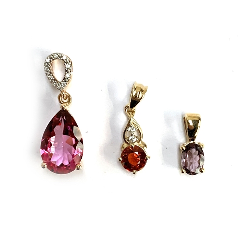 68 - Three 9ct gold pendants, one set with a purple Mahenge spinel; mystic pink topaz; and mandarin garne... 