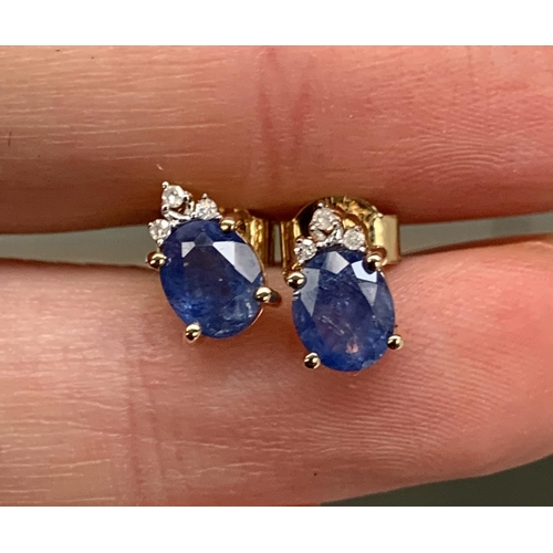 77 - A pair of 9ct gold sapphire and diamond stud earrings, the sapphires totalling 1.6cts, gross weight ... 