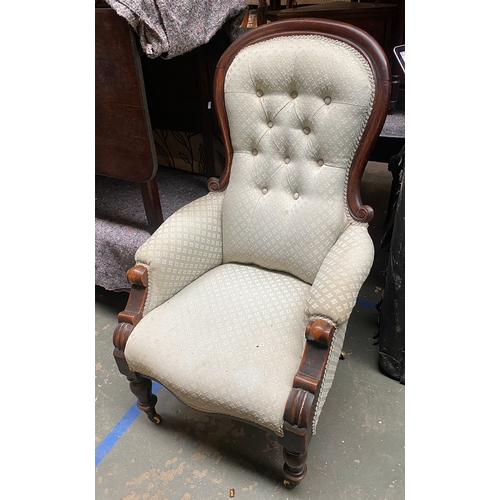 1249 - A Victorian mahogany framed button back bedroom chair, on turned legs and ceramic casters