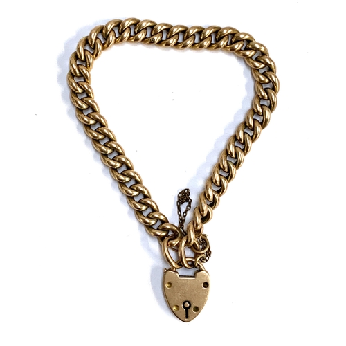 111 - An antique 9ct gold curb link bracelet with heart padlock clasp, stamped 9ct, 18.2g