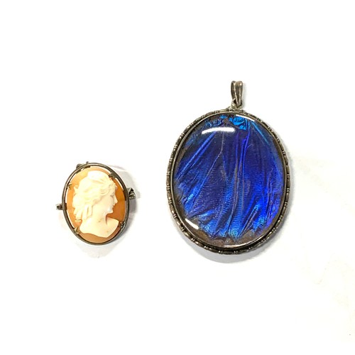 109 - An Art Deco silver mounted morpho butterfly wing pendant, 4cmL; together with a small shell cameo br... 