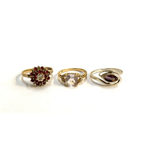 118 - A 9ct gold ruby and diamond cluster ring, size S; together with a 9ct gold quartz ring, size M 1/2, ... 