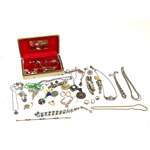 32 - A quantity of costume jewellery to include Jacobite Scottish style pendant; silver plated chains; HA... 