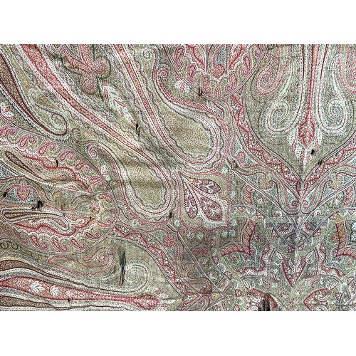 678 - A 19th century Kashmir Amli-Rumal shawl of olive green and red wool (af), approx. 175x180cm