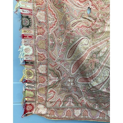 678 - A 19th century Kashmir Amli-Rumal shawl of olive green and red wool (af), approx. 175x180cm