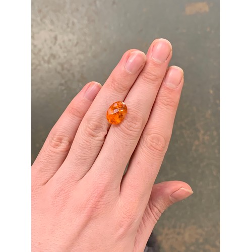 43D - A 10.61ct Tanzanian Mandarin garnet, measuring approx. 15x10mm, purchased by the vendor in 2021 for ... 