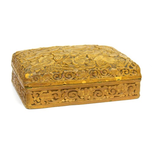 224A - An unusual Chinese yellow/mustard coloured lacquer box, carved with profuse floral decoration includ... 