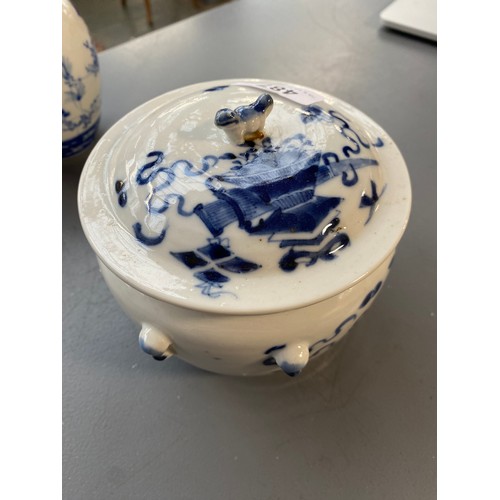 487 - A quantity of blue and white porcelain to include Chinese twin handled jar decorated with precious o... 