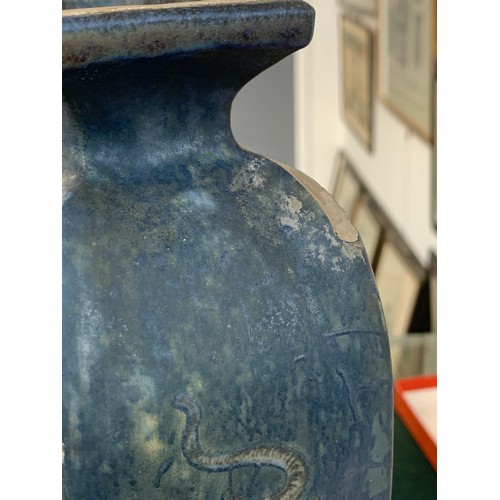 156 - A late Victorian Martin Brothers stoneware vase of tapering form (chipped), decorated with dragons o... 