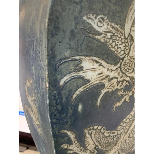 156 - A late Victorian Martin Brothers stoneware vase of tapering form (chipped), decorated with dragons o... 