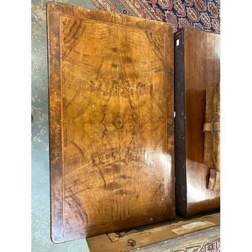 365 - An 18th century walnut kneehole dressing table, the quarter veneered feather banded top over seven d... 