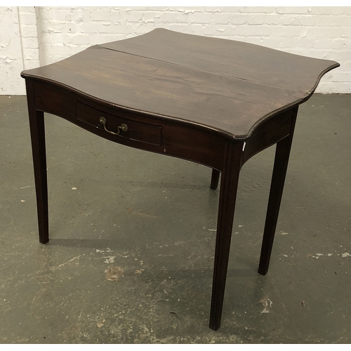 1158 - A George III serpentine mahogany tea table, foldover top over a single drawer, on reeded square tape... 