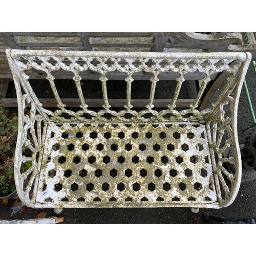 469 - A white painted garden bench with quatrefoil pierced back, 87cmW

Provenance: from the estate of the... 