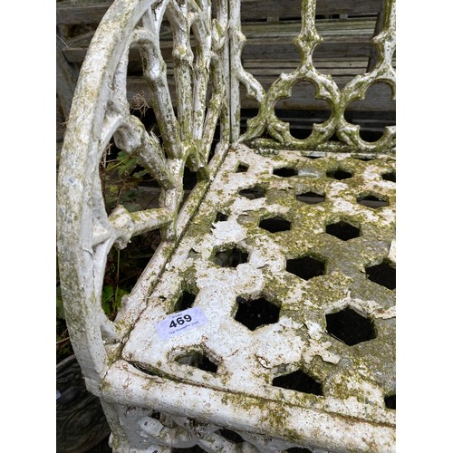 469 - A white painted garden bench with quatrefoil pierced back, 87cmW

Provenance: from the estate of the... 