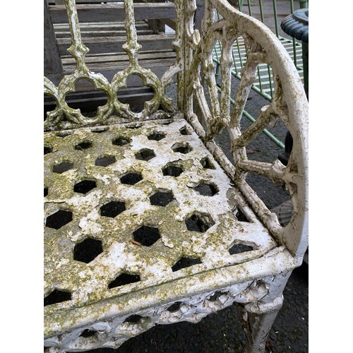 469 - A white painted garden bench with quatrefoil pierced back, 87cmW

Provenance: from the estate of the... 